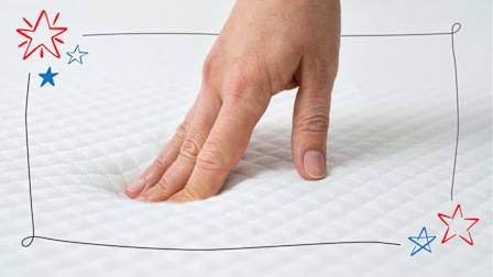 hand on mattress with line boarder and stars