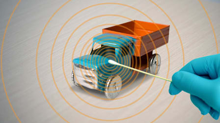 Hand and swab testing a toy truck for lead