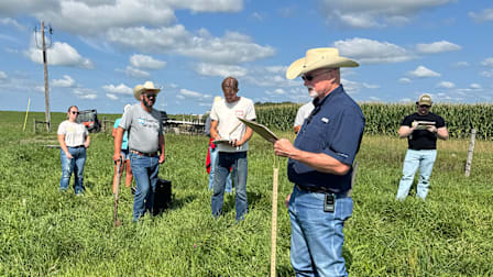 Farmers standing in a field