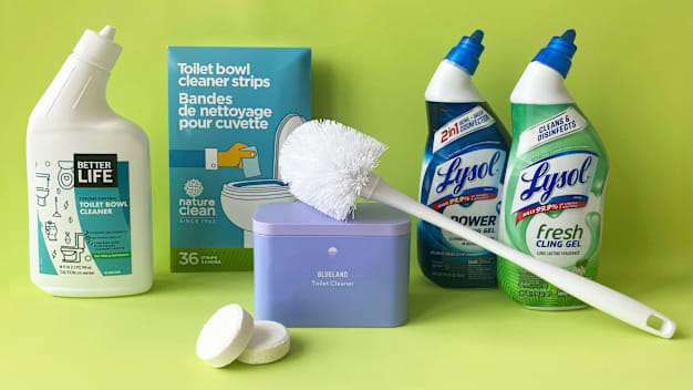 Liquid, tablet, and toilet bowl cleaners strips on a lime green background with w toilet bowl brush