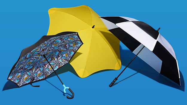 Shed Rain Reverse closing stick umbrella, Blunt Exec umbrella and GustBuster The Pro Series Gold umbrella
