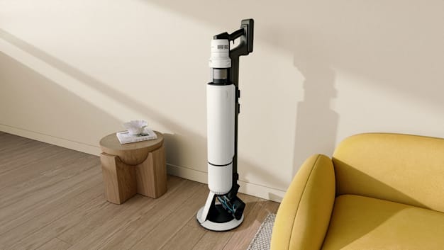 Samsung Bespoke AI Jet Ultra VS90F40DMK/AA vacuum cleaner in a living room.