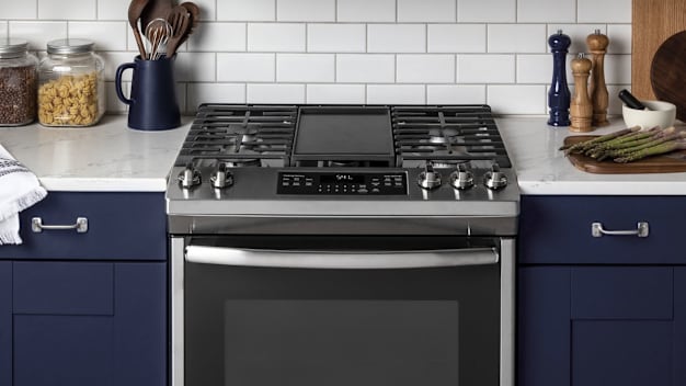 GE gas stovetop in kitchen