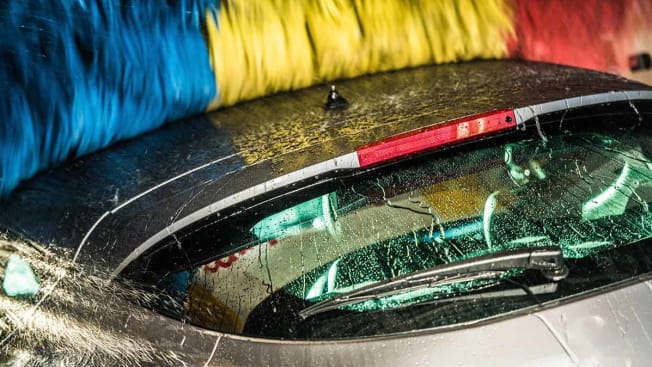 detail of car getting cleaned in car wash