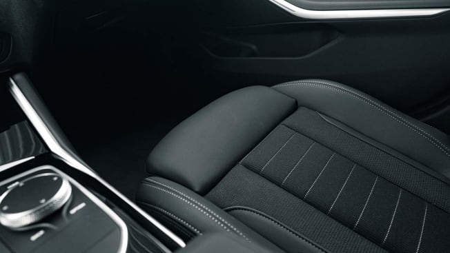 Interior of car seat with dark fabric