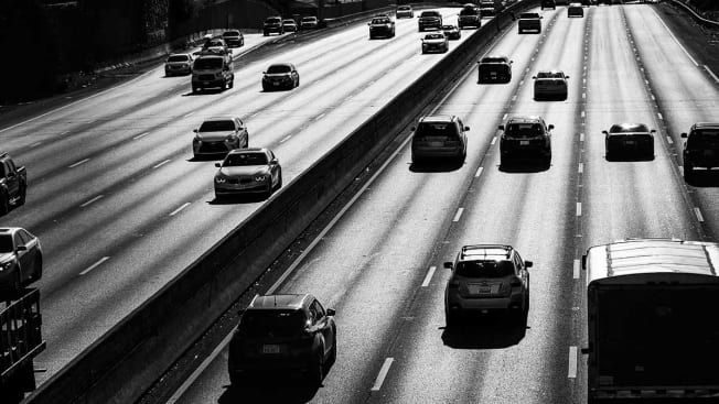 Cars driving on a highway.