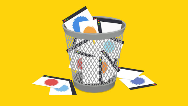 Garbage can filled with discarded online ads