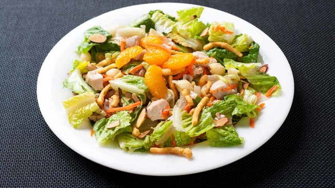 salad with chicken, oranges, carrots, almonds