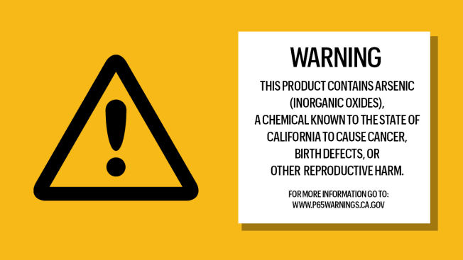 A triangle warning sign and a sign that contains a Prop 65 warning.