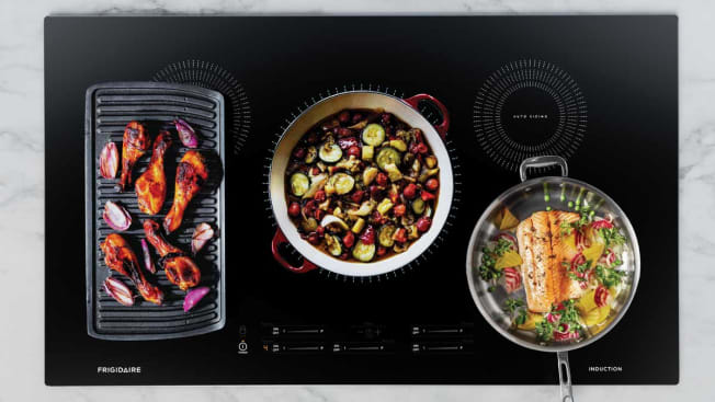 overhead view of induction cooktop with various types of cookware