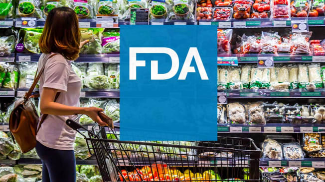 FDA logo overlaid over a photo of a person shopping in a grocery store.