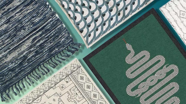 green, blue, and white patterned rugs on a green background
