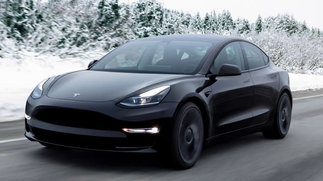 2023 Tesla Model 3 driving in winter