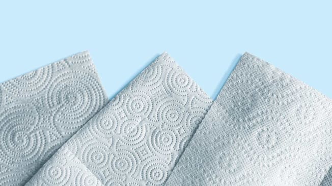 3 paper towels against a blue background