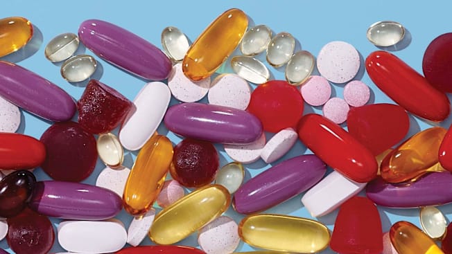 assortment of different shaped and colored pills
