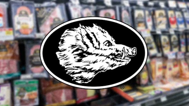 Deli meats in grocery store with Boar's Head logo.