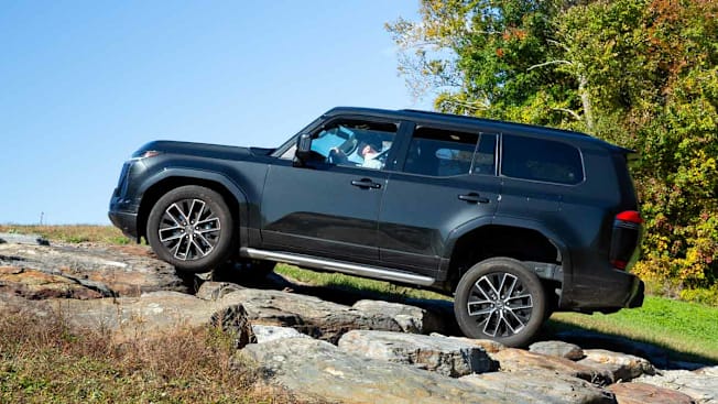 Lexus GX climbing the rock wall at the Consumer Report test track