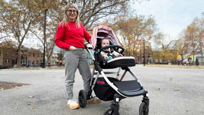 CR Senior Multimedia Content Creator Angela Lashbrook tests the Mockingbird 2.0 Stroller with her baby in it