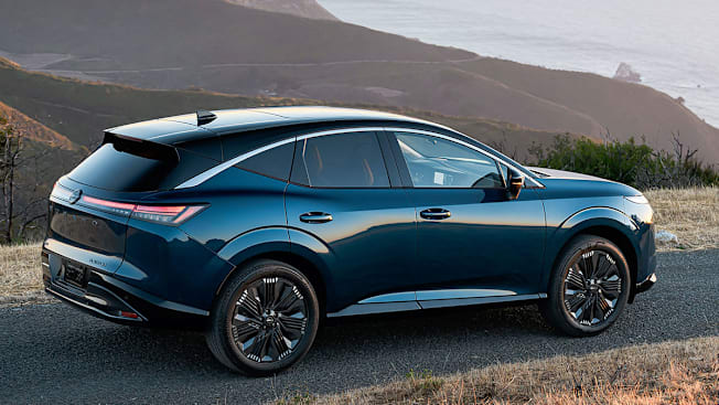 2026 Nissan Murano, shown from rear on a scenic road