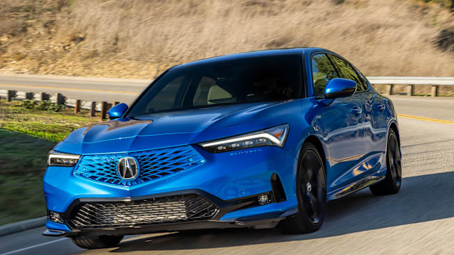 2026 Acura Integra A-Spec Tech 6MT driving on a curvy road