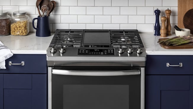GE gas stovetop in kitchen