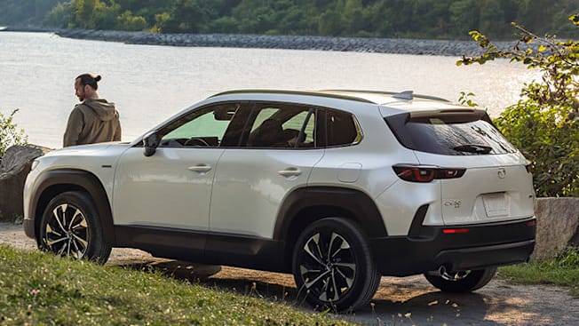 2026 Mazda CX-50 Hybrid, rear, by water