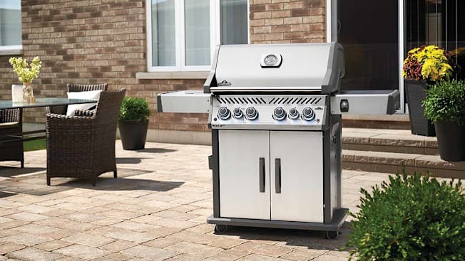 Napoleon Rogue RSE525RSIBPSS-1 gas grill seen on a patio.