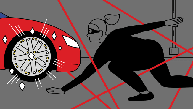 Cat burglar climbing through lasers to get to a fancy wheel rim on a car.