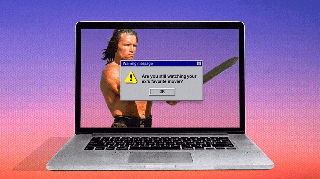 Laptop computer opened with Conan the Barbarian playing with a blinking warning on the screen.