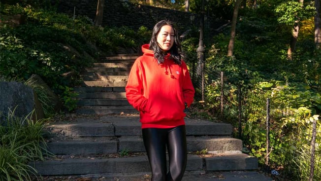 Perry Santanachote going for a walk in a hoodie from Champion.