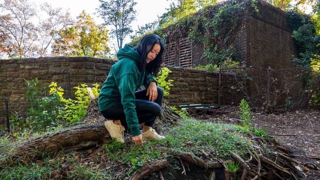 Perry Santanachote posing in a hoodie from H&M.