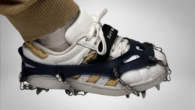 detail of person's foot and ankle showing Yatta Life ice cleats