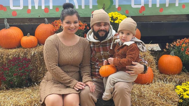 Tashiana and Luis Diaz seen with their child Micah