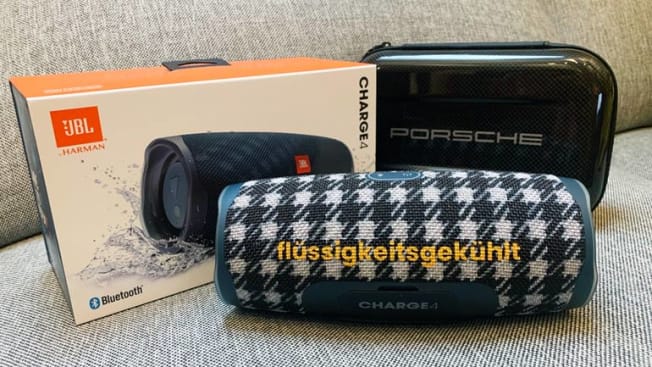 JBL Charge4 with custom design and packaging with Porsche pattern and packaging in background
