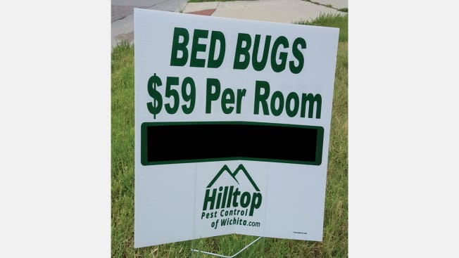lawn sign that advertises Bed Bugs for $59 per room