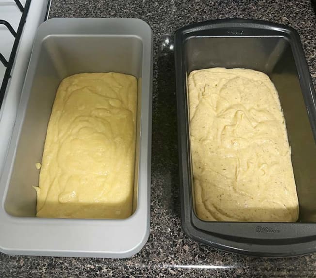 Two bread pans holding batter, one using flax "egg" and one using regular egg.