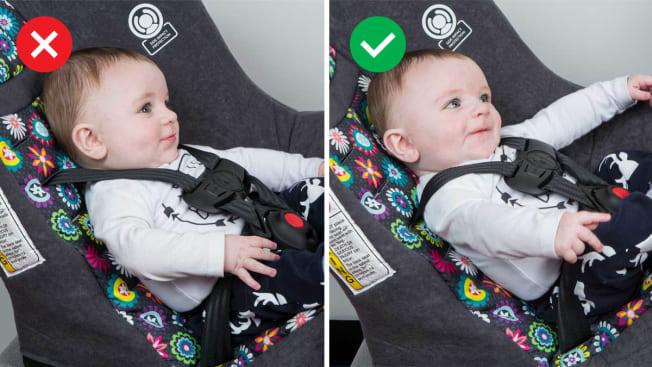 Baby in a rear-facing car seat.