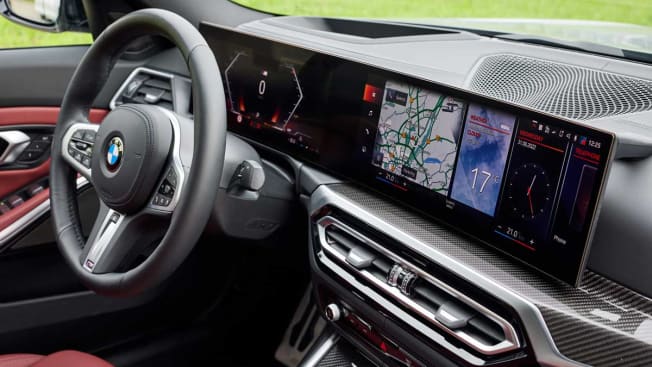 A M340i xDrive Sedan with a built-in navigation system