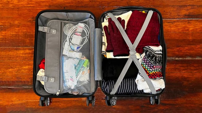 Suitcase filled with clothing