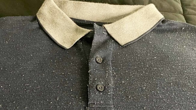a damaged shirt after a laundry mishap
