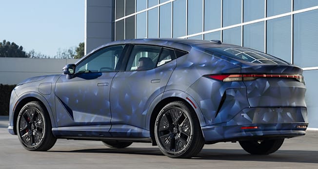 Acura RSX EV SUV prototype in camo, rear