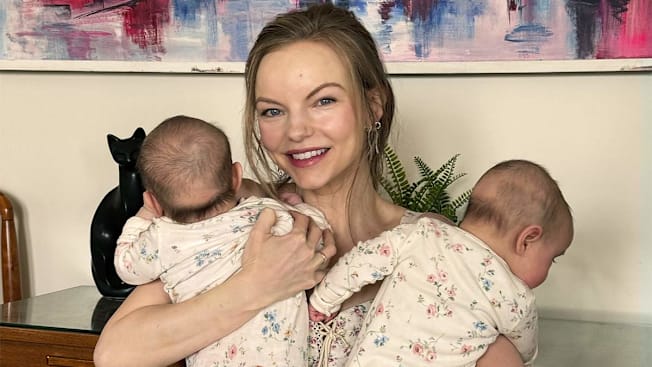 Laura Murphy with her twin infant daughters.