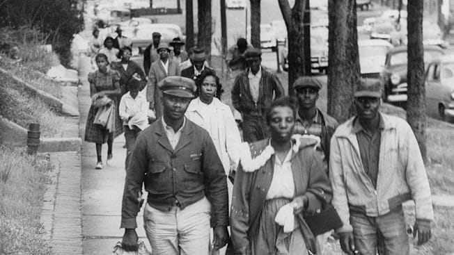 African Americans walk to work instead of riding the bus during the third month of an eventual 381-day bus boycott, Montgomery, Alabama, February 1956.
