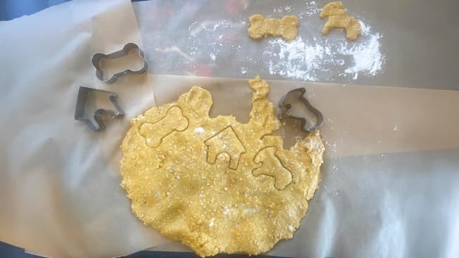 Dog treat dough with cookie cutters