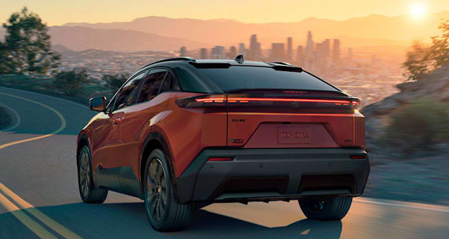 2026 Toyota C-HR driving, rear