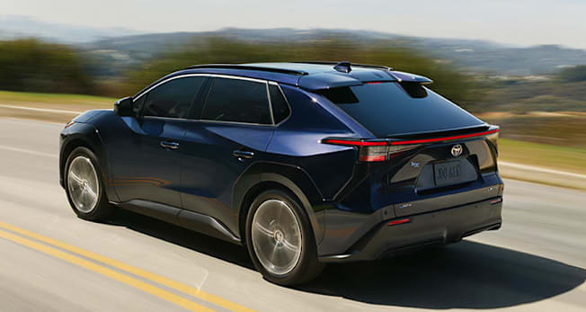 2026 Toyota bZ driving, rear