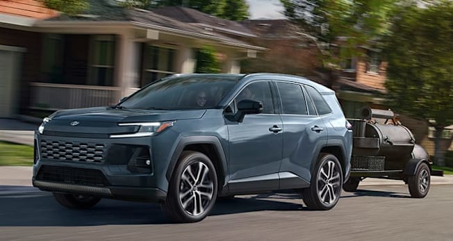 2026 Toyota RAV4 Limited towing a grill trailer