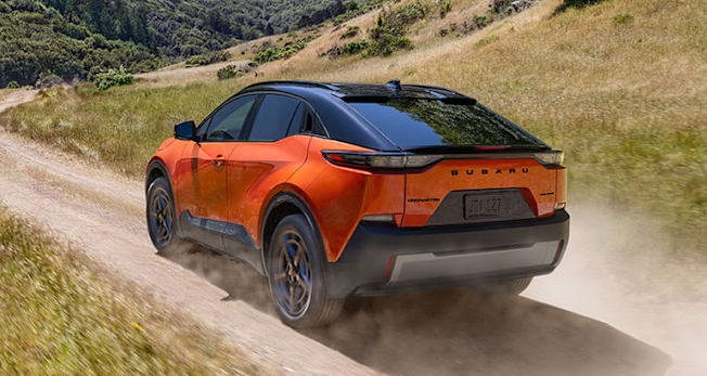 2025 Subaru Uncharted rear driving in dirt