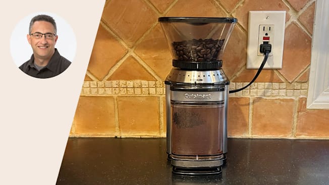 A portrait of Rich Handel and the Cuisinart Supreme Grind Automatic Burr Mill plugged into an outlet on a kitchen counter.