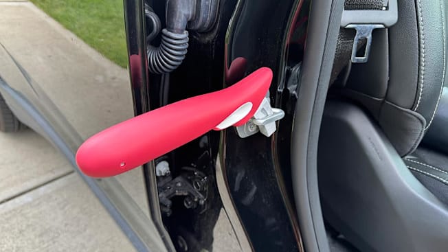 The Stander Handybar exit assistance tool attached to car